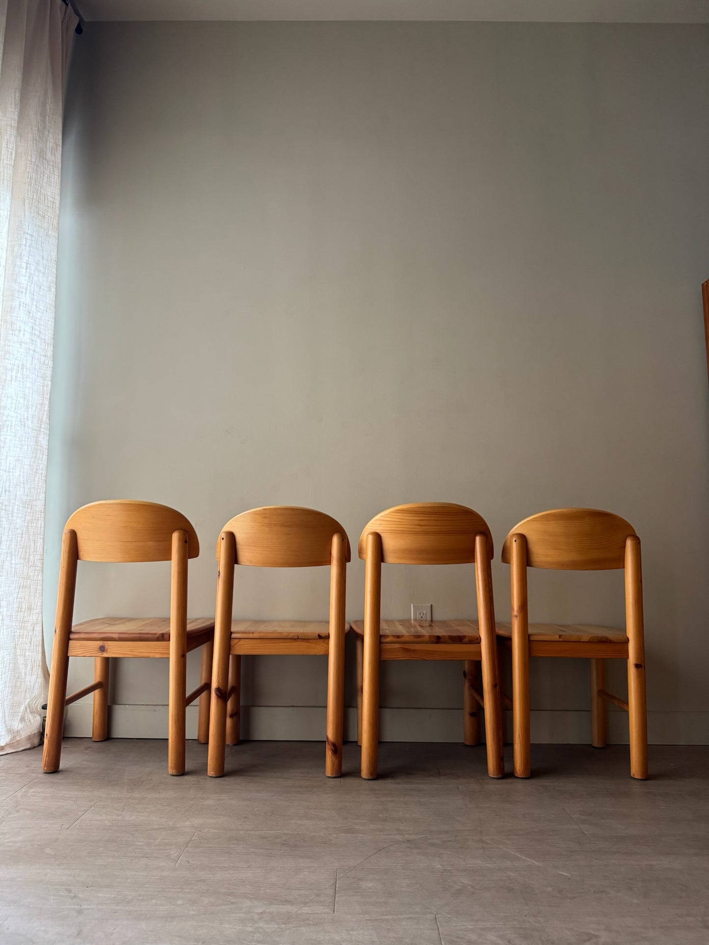 Rainer Daumiller pine dining chairs. Sold as a set of 4.