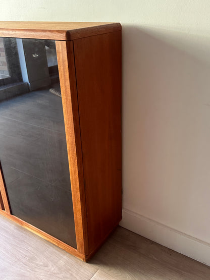 Smoked glass and teak bookcase