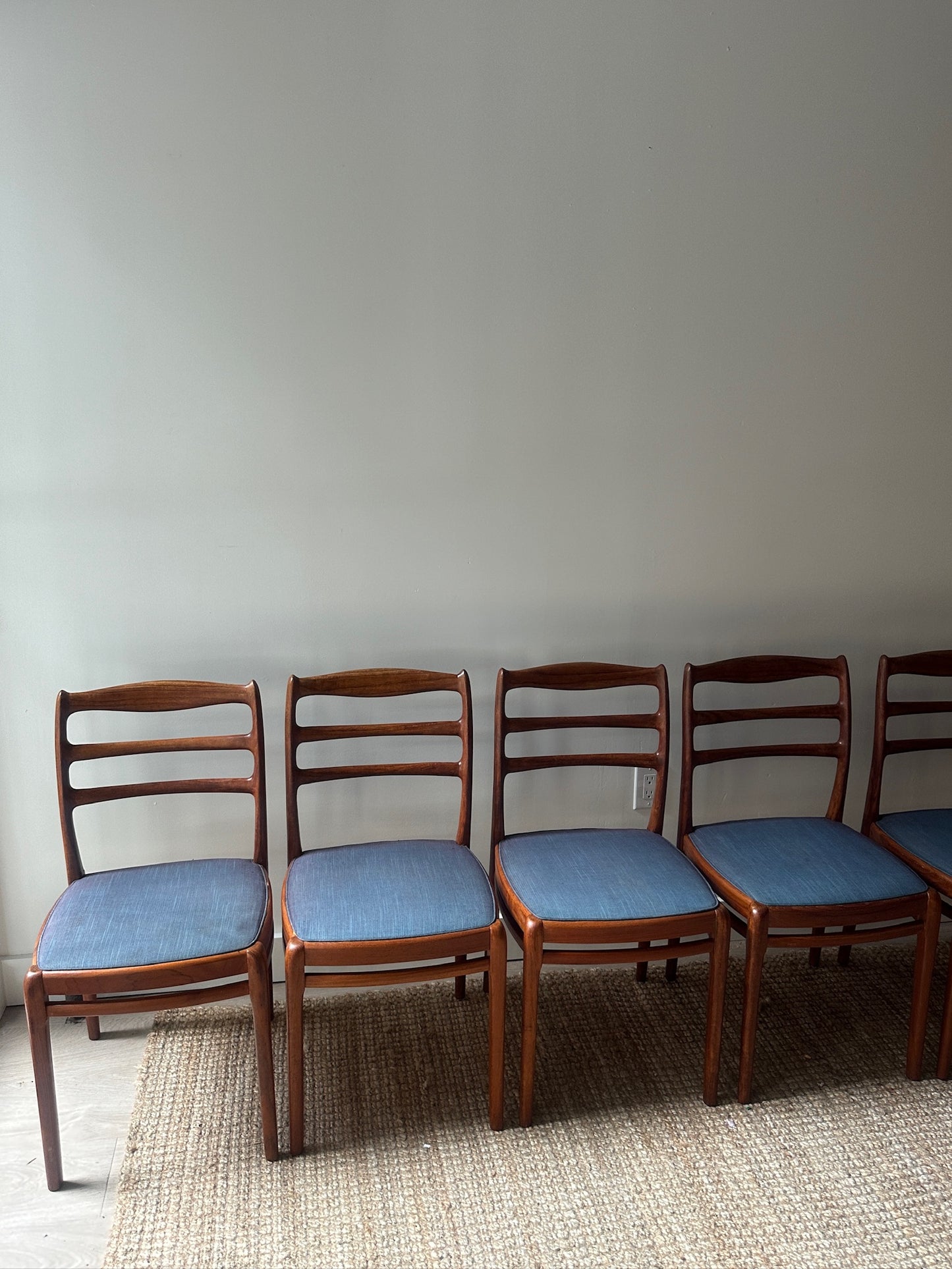 Set of Six Danish Walnut Dining Chairs. Sold individually.