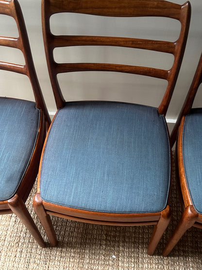 Set of Six Danish Walnut Dining Chairs. Sold individually.