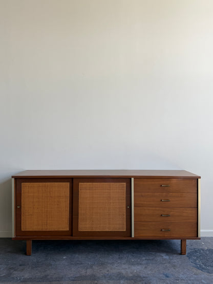 Walnut credenza with caned sliding doors