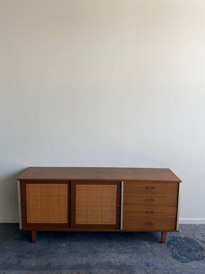 Walnut credenza with caned sliding doors