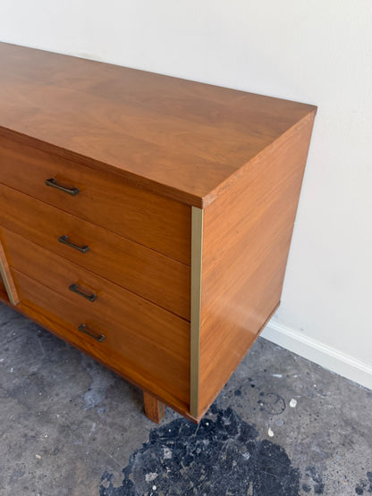 Walnut credenza with caned sliding doors