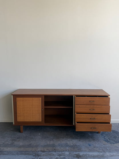 Walnut credenza with caned sliding doors